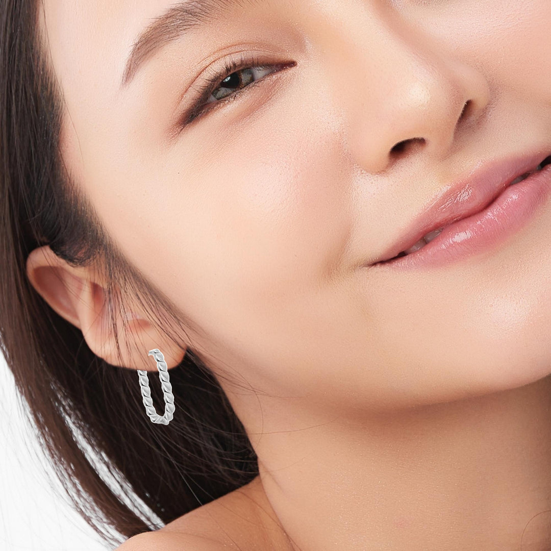 10 Karat 18MM Huggie Earrings