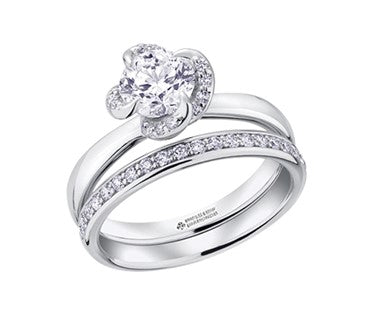 18 Karat Halo Engagement Ring, 0.31 CT Center